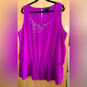 Like new Lane Bryant gauze sleeveless blouse embellished with sequins.